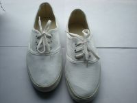 Sell White canvas tennis shoes