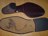 Sell leather outsole, stacked heel.