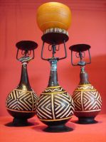 Candle holders made from calabash and recylcled metal
