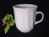 Sell Porcelain coffee and tea cup, white mug with folds on the surface