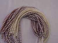 Sell  brown high quality pearl strands