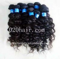 Sell natural color curly virgin brazilian hair full cuticle
