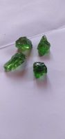 Sell Gemstones-Green Tsavorite, Unheated rough Tanzanites, Rhodolite garnets, mint garnets, teal sapphires, tourmalines, iolites