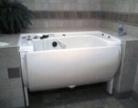 Motorized walk-in bathtub