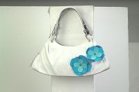 Sell ladies' handbags,traveling bags,backpacks,cosmetic bags and ect.