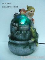 resin fountain with gnome decoration