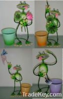 metal frog with flower pot