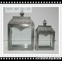 Metal lantern with glass pannel