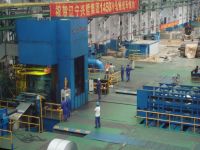 Reversible cold rolling mill, tandem cold rolling mill