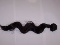 Machine weft curly