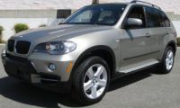 Import/Export 2011 BMW X5 XDR35D Gold on Tan MSRP: $61, 475