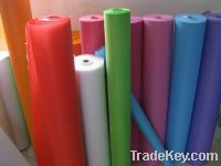 Colored nonwoven interlining