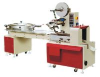 Automatic candy pillow packaging machine