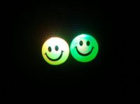 Cute four cm glow in the dark smily face balls