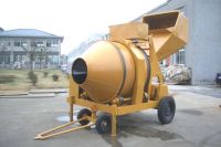 Sell diesel concrete mixer with hydraulic tipping hopper