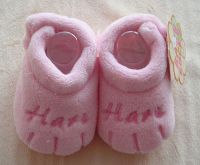 pink baby shoes with paw