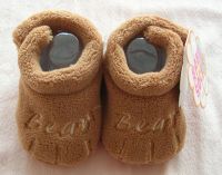 brown baby shoes with paw