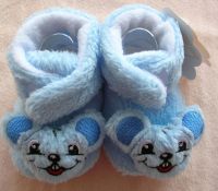 light blue baby shoes with cat head