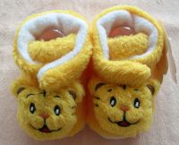 yellow baby shoes with tiger head