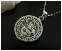 Sell sterling silver pendant enchased with jade