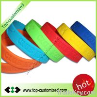 Sell 2012 Newest style debossed silicone bands customized