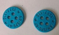Metal button with 4 holes