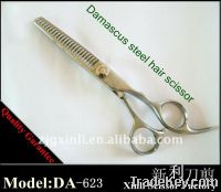 Sell finely crafted and high class Damascus Steel hair scissor