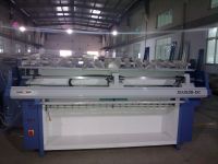 Double carriage collar knitting machine