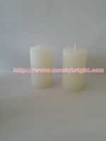 white dinner pillar candles
