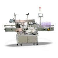Sell Double-sides automatic adhesive Oil Bottle labeling machine