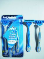 Triple blade disposable razor