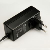 Sell   15V  Exchangeable Plug Power Adapter