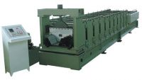 Corrugated roof forming machine
