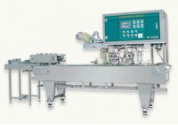 Box motion continuous cup / tray sealer