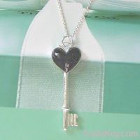 Sell spark key charm necklace