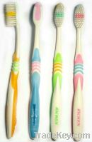 Sell toothbrush with tongue cleaner
