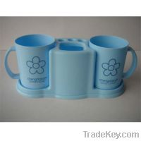 Sell Plastic rack with cup and toothbrush and toothpaste holder
