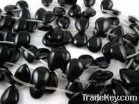 Sell black onyx smooth teardrop beads