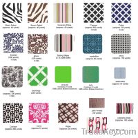 Multiple printed rolls of fabric for sale