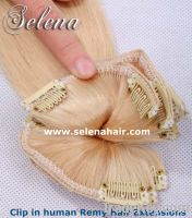 Sell 100% human clip on hair extensions