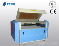 Sell xj1280 fabric laser cutting machine price