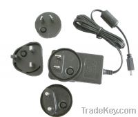 Sell 12V 1A adapter with interchangeable AC plug EU, USA, AU, UK plug