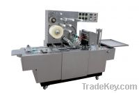 Automatic transparent film over wrapping machine