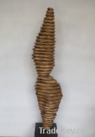 handcrafted wood statue, wood carving in abstract style