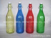 Sell round glass bottles with lids