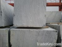 black wooden vein marble block