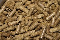 Hay pellets for burning. They burn just as well as wood pellets, but hay pellets are cheaper.