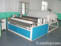 Automatic toilet paper rewinding and perforatingand embossing machine