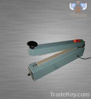 Sell hand impulse sealer with middle cutter