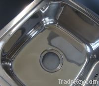 Sell sink polishing machine on the side of the bowl